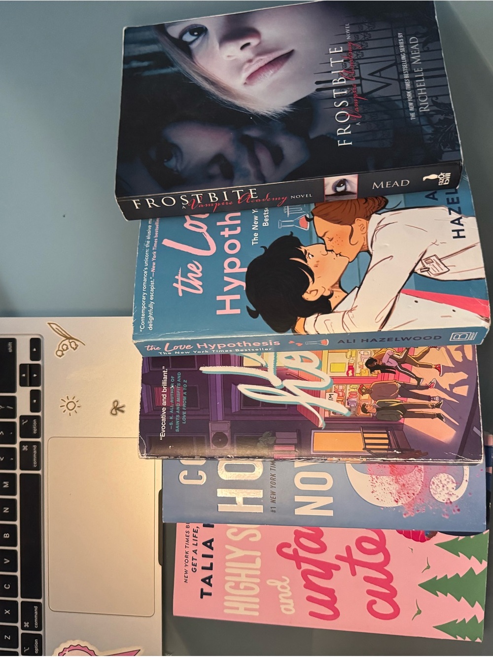 Indigo Paperback Romance & YA Book Stack in Blue, Pink, Black